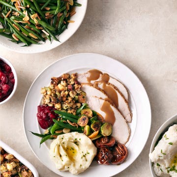 overhead of turkey meal on white surface