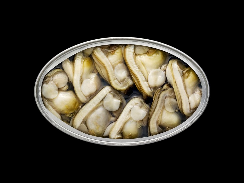 overhead view of a tin can with clams