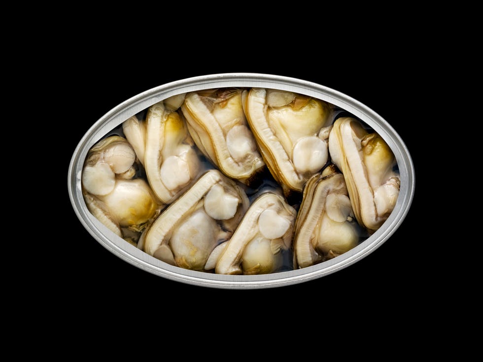 overhead view of a tin can with clams