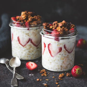 Overnight oats with strawberries and granola in jar