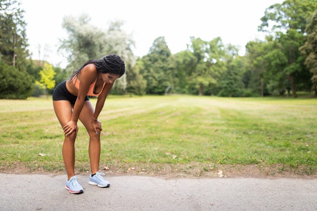 overtraining by young woman athlete taking a break