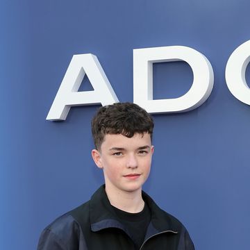 owen cooper smiles wearing blue jacket