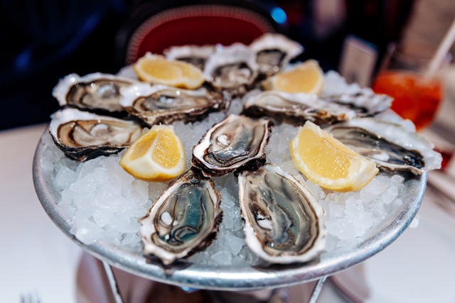 oysters plate served in a luxury restaurant, paris, france