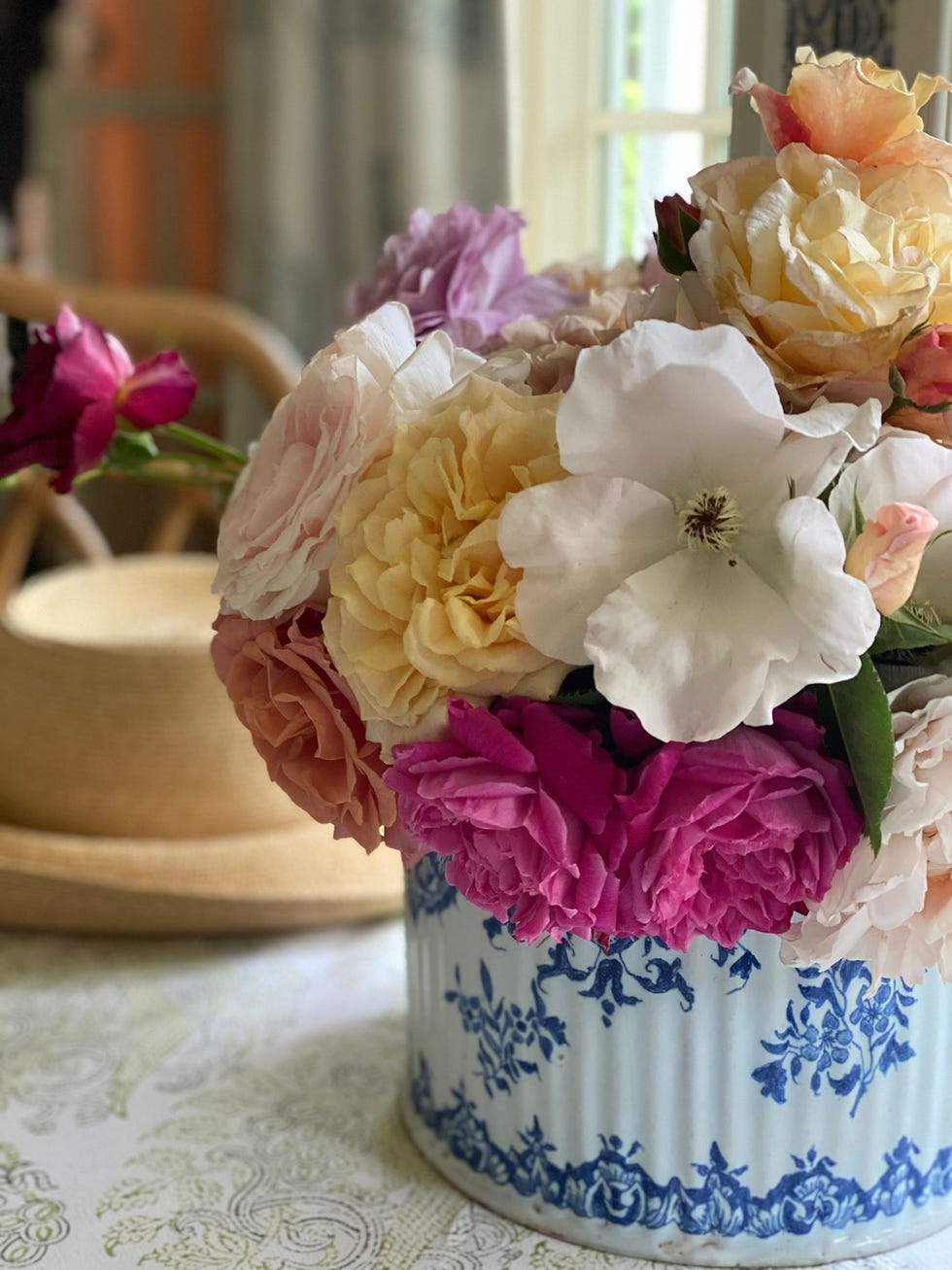 blue pot with flowers