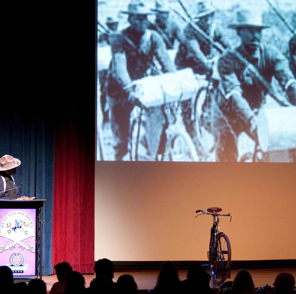 p334rr ron jones, a member of the 9th and 10th cavalry horse association, presents a historical vignette on the iron ridersthe 25th infantry us army bicycle corps, at the black chamber of orange countys annual banquet at the disneyland hotel august 27, 2016, in anaheim, calif the banquet, held annually, highlights a black history theme each year this years theme was the legacy of buffalo soldiers, or soldiers who served in segregated african american units from 1866 1954 us army photo by sgt 1st class alexandra hays, 79th sustainment support command