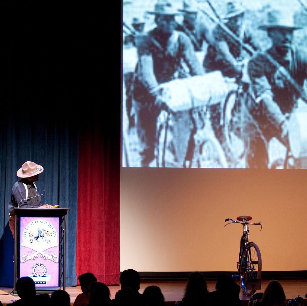p334rr ron jones, a member of the 9th and 10th cavalry horse association, presents a historical vignette on the iron ridersthe 25th infantry us army bicycle corps, at the black chamber of orange countys annual banquet at the disneyland hotel august 27, 2016, in anaheim, calif the banquet, held annually, highlights a black history theme each year this years theme was the legacy of buffalo soldiers, or soldiers who served in segregated african american units from 1866 1954 us army photo by sgt 1st class alexandra hays, 79th sustainment support command