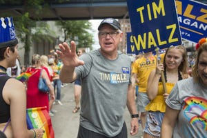 governor of minnesota tim walz at a parade