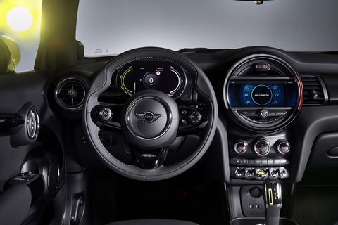 Vehicle, Motor vehicle, Car, Steering wheel, Center console, Speedometer, Steering part, Luxury vehicle, Mini, Automotive design, 
