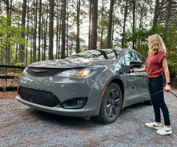 chrysler pacifica hybrid being plugged in