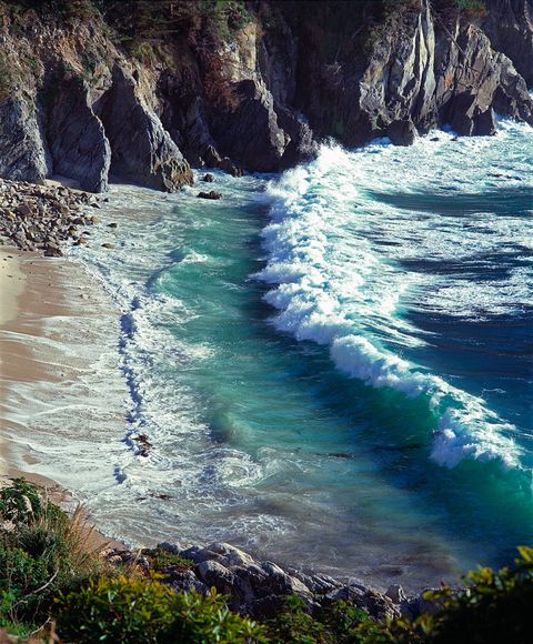 A Pacific Wave Meets The Shore In The Carmel Highlands, Monterey Bay Sanctuary