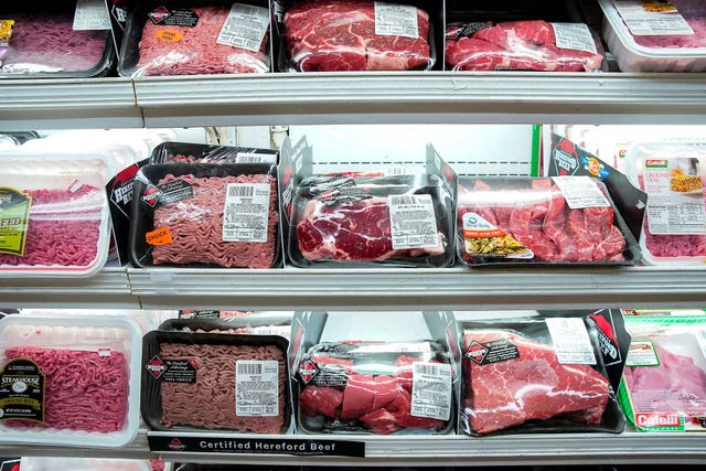 packages of various meats are seen in a supermarket