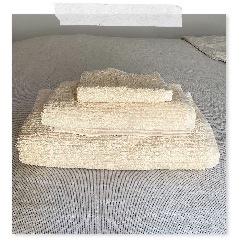 stack of three tan pact towels
