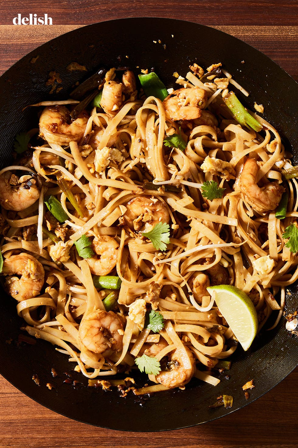 shrimp pad thai with cilantro, peanuts, and lime