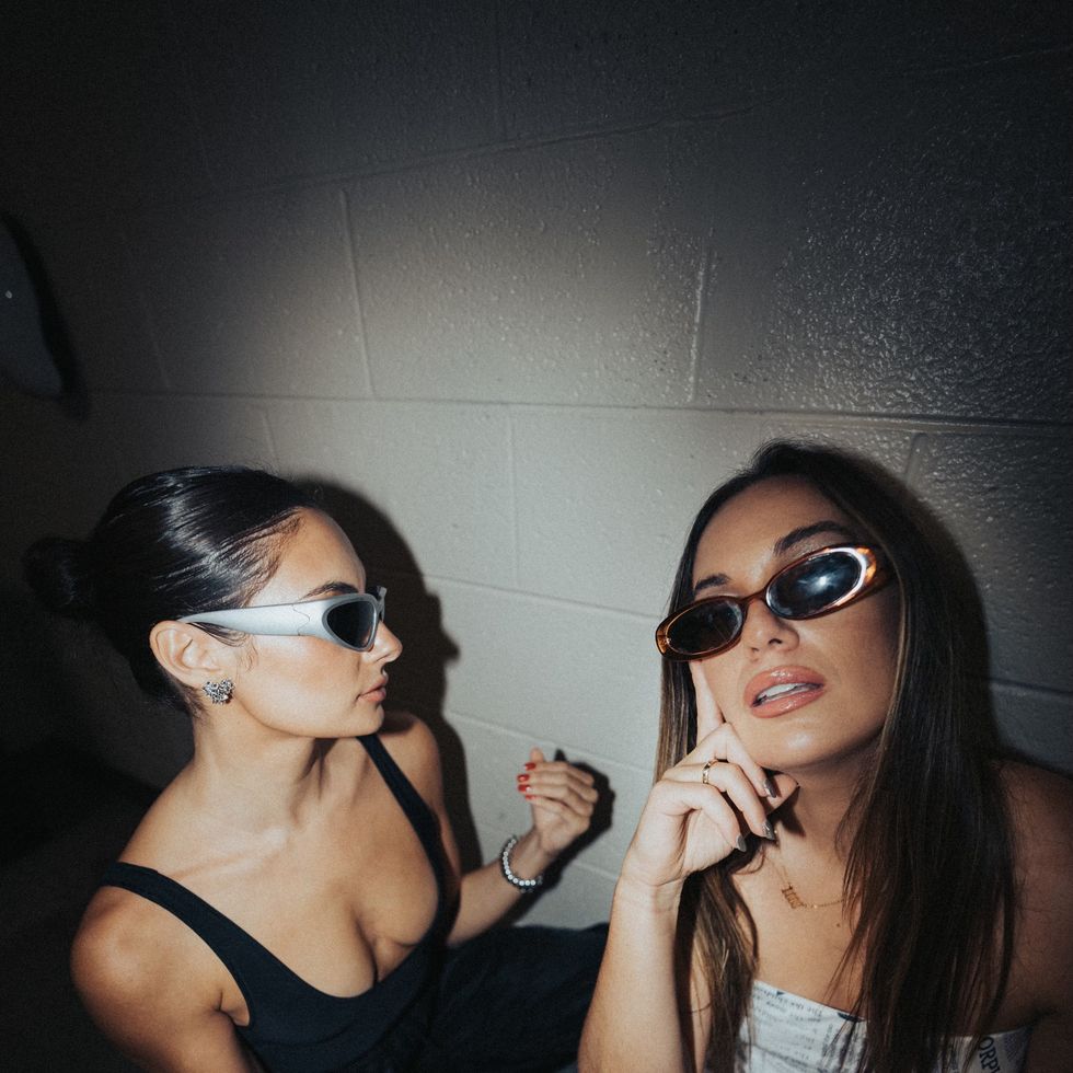 paige desorbo and hannah berner wearing sunglasses