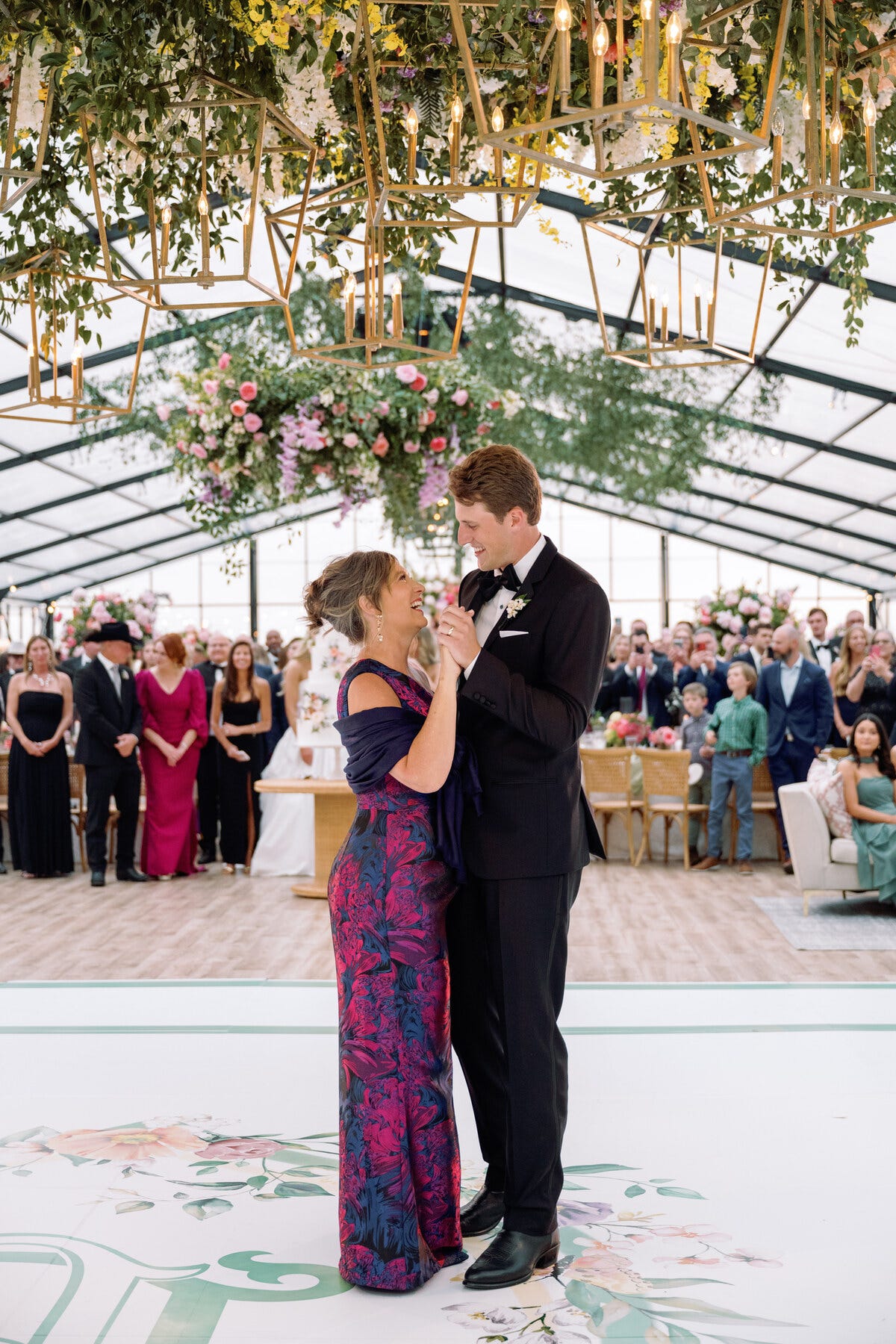 celebration scene with a couple dancing at a wedding reception