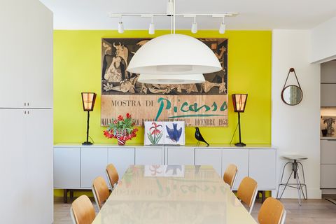 dining area with neon yellow accent wall