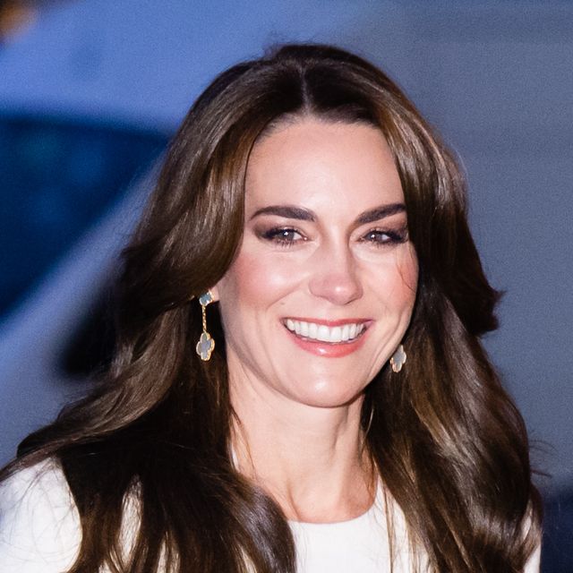 kate middleton smiles on her way into a carol concert