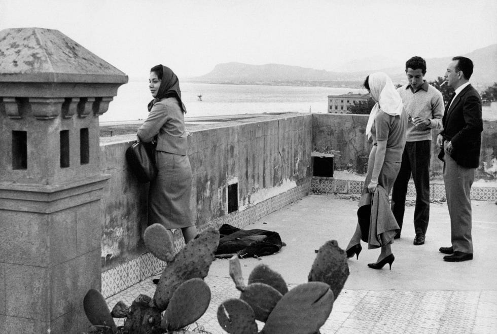 Some people looking at the panorama in Palermo