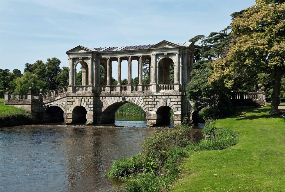 palladian bridge in the park at wilton house