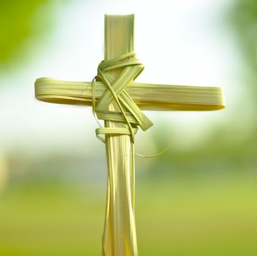 cross made out of palm fronds