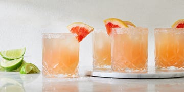 paloma cocktail with a salt rim and grapefruit garnish