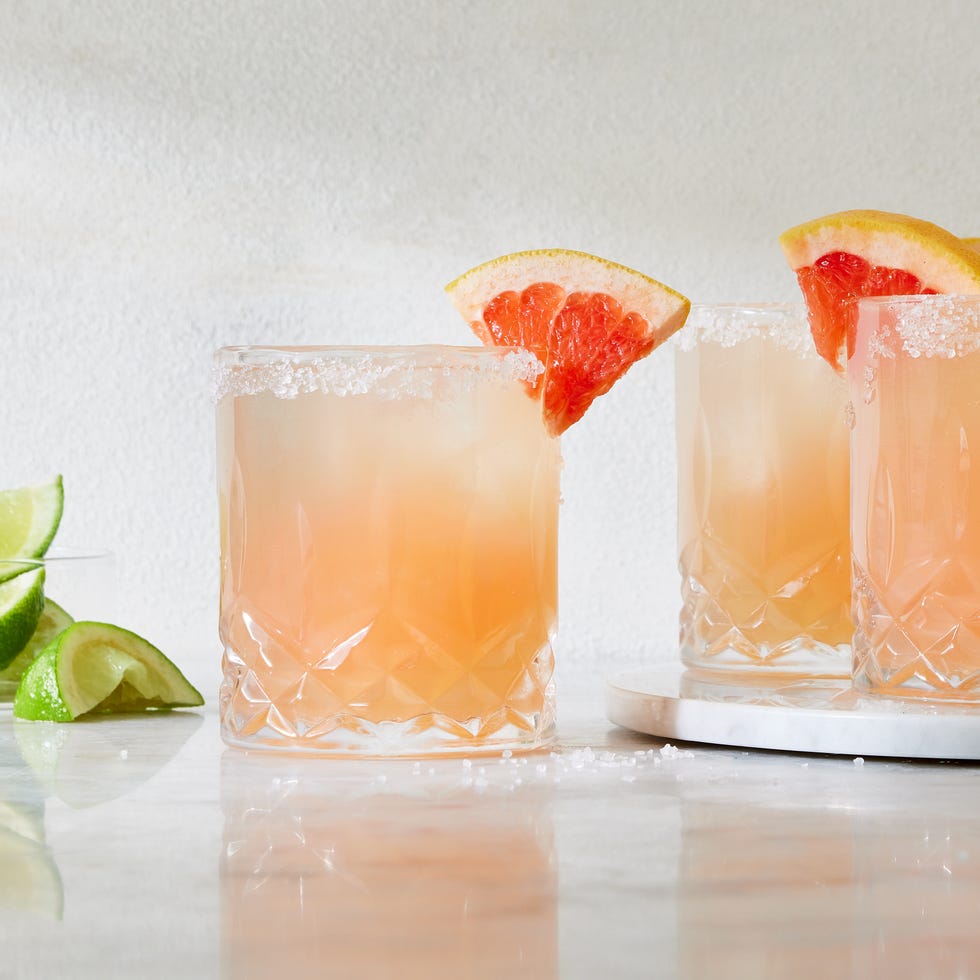 paloma cocktail with a salt rim and grapefruit garnish
