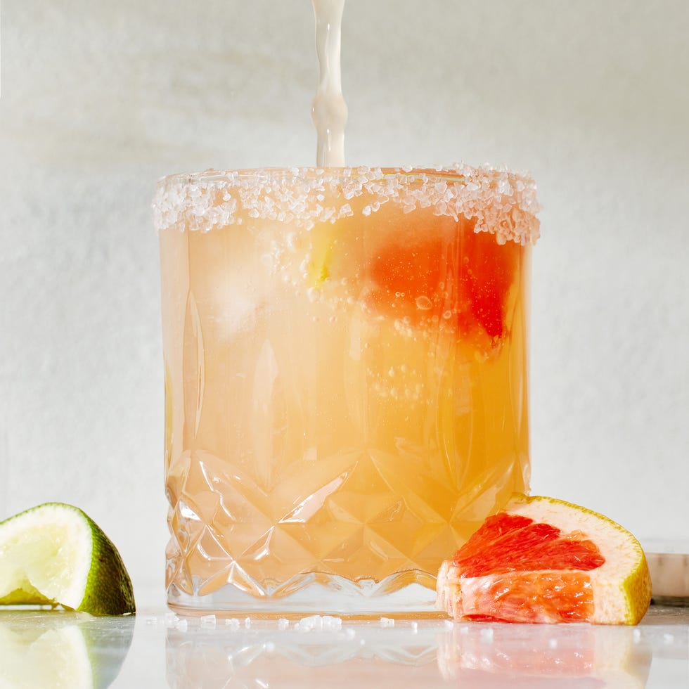 paloma cocktail with a salt rim and grapefruit garnish