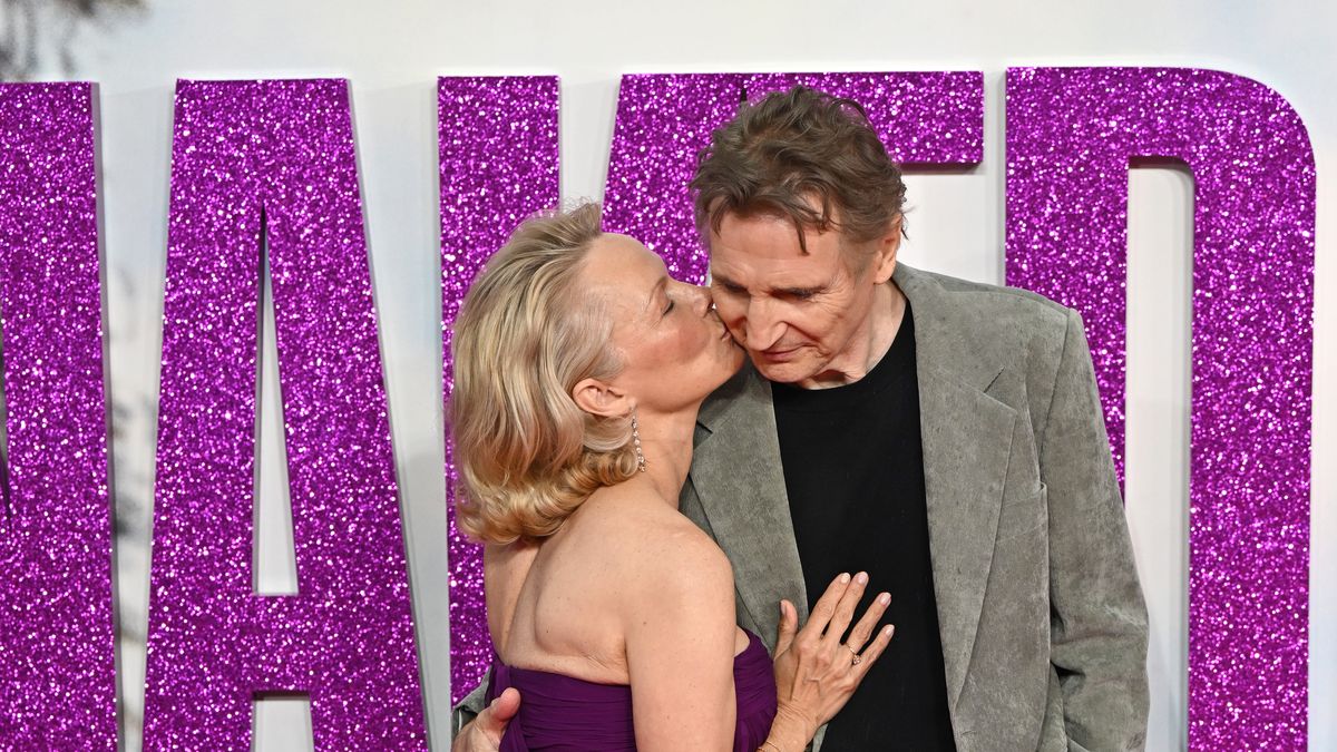pamela anderson and liam neeson at the naked gun premiere