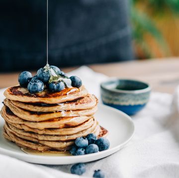 homemade pancakes with blueberries and honey