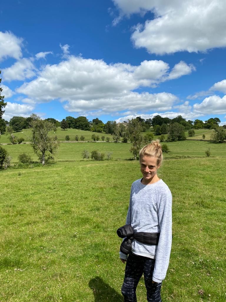 pandora pictured in walking clothes in a green field