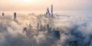 panoramic view of Shanghai city over the advection fog at sunrise