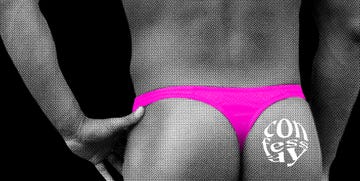 a man wearing a hot pink thong