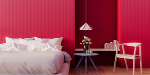 bedroom with painted pink walls