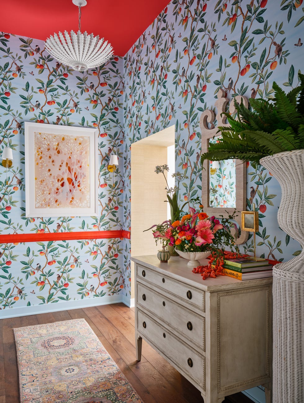 hallway with orange wallpaper