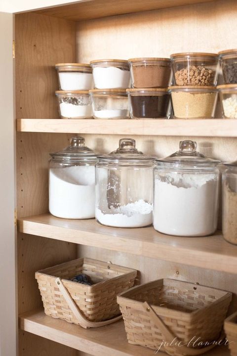 pantry organization ideas, glass jars and baskets full of spices