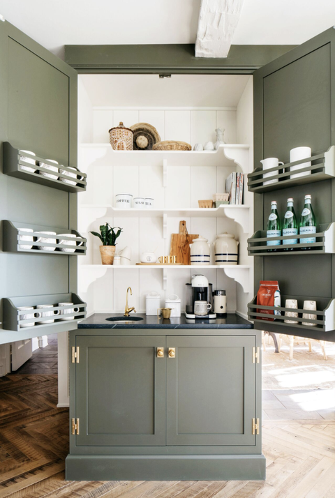 pantry organization ideas, large open cabinet in the kitchen with coffee, mugs and a sink