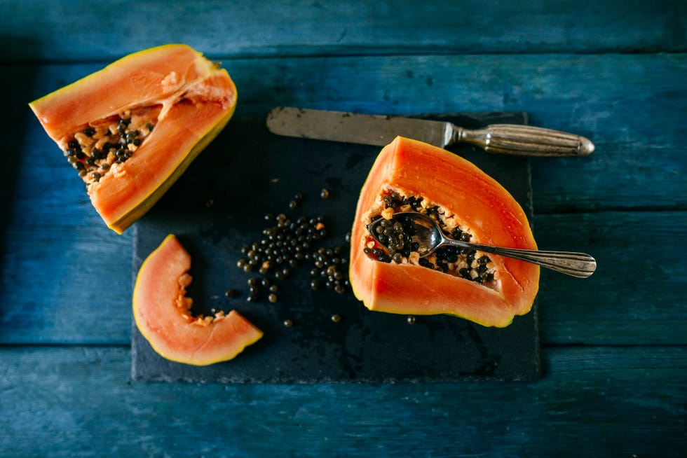 papaya cut on slate plate