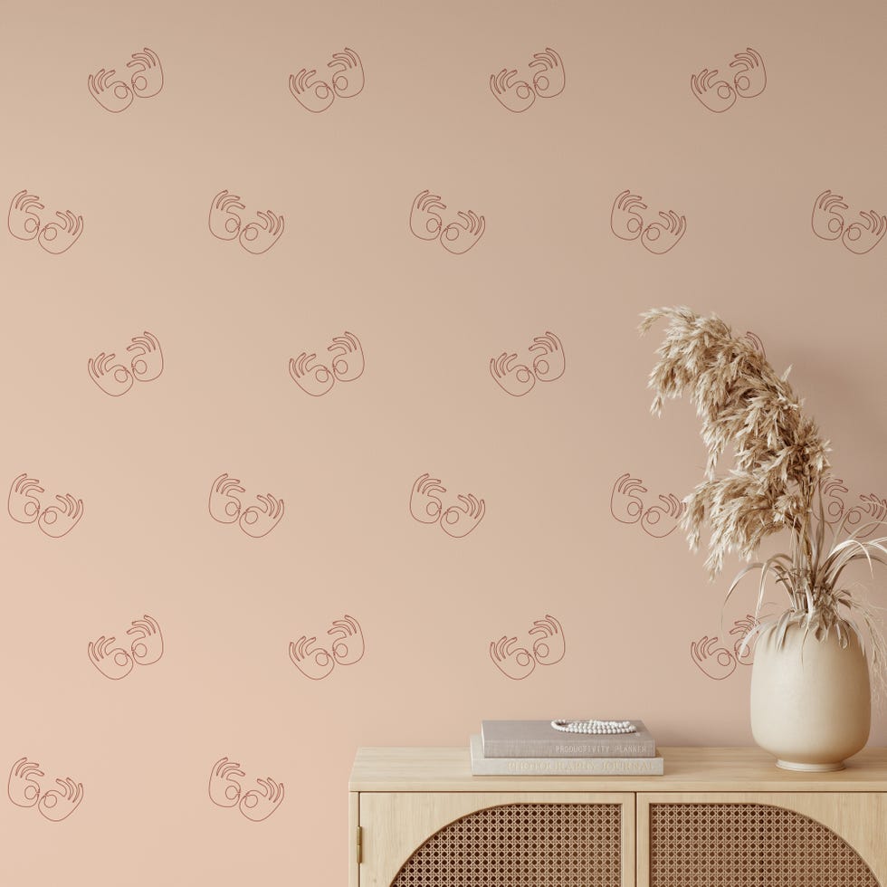 papel pintado rosa con dibujos de manos