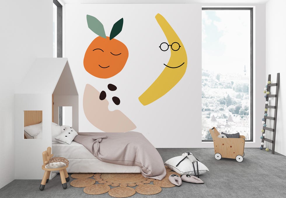 dormitorio infantil decorado con un mural