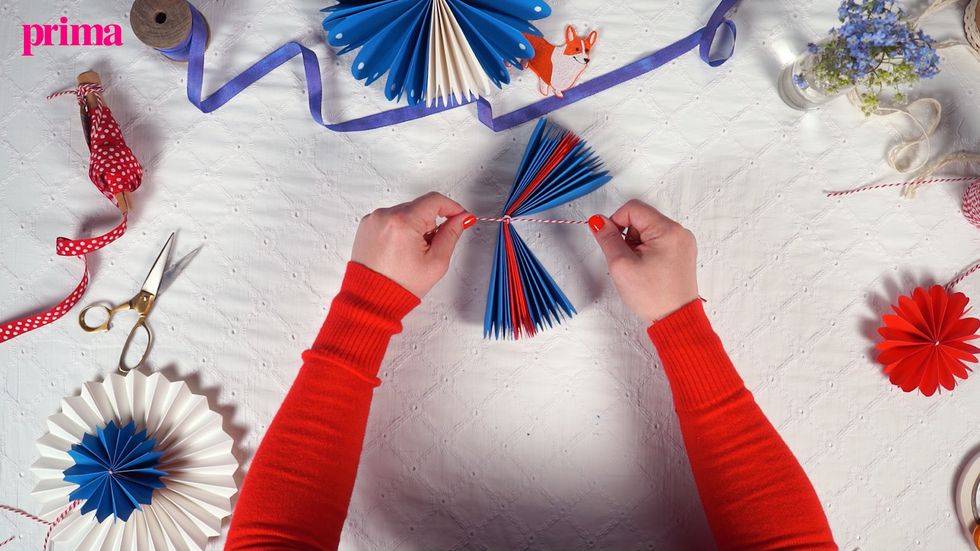 How to make DIY Paper Fan Decorations by The Listed Home
