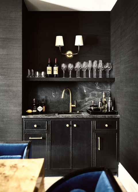 dining room and bar, blue chairs, black bar