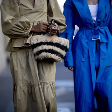 Street fashion, Fashion, Fur, Coat, Human, Trench coat, Outerwear, Electric blue, Overcoat, Fashion accessory, 