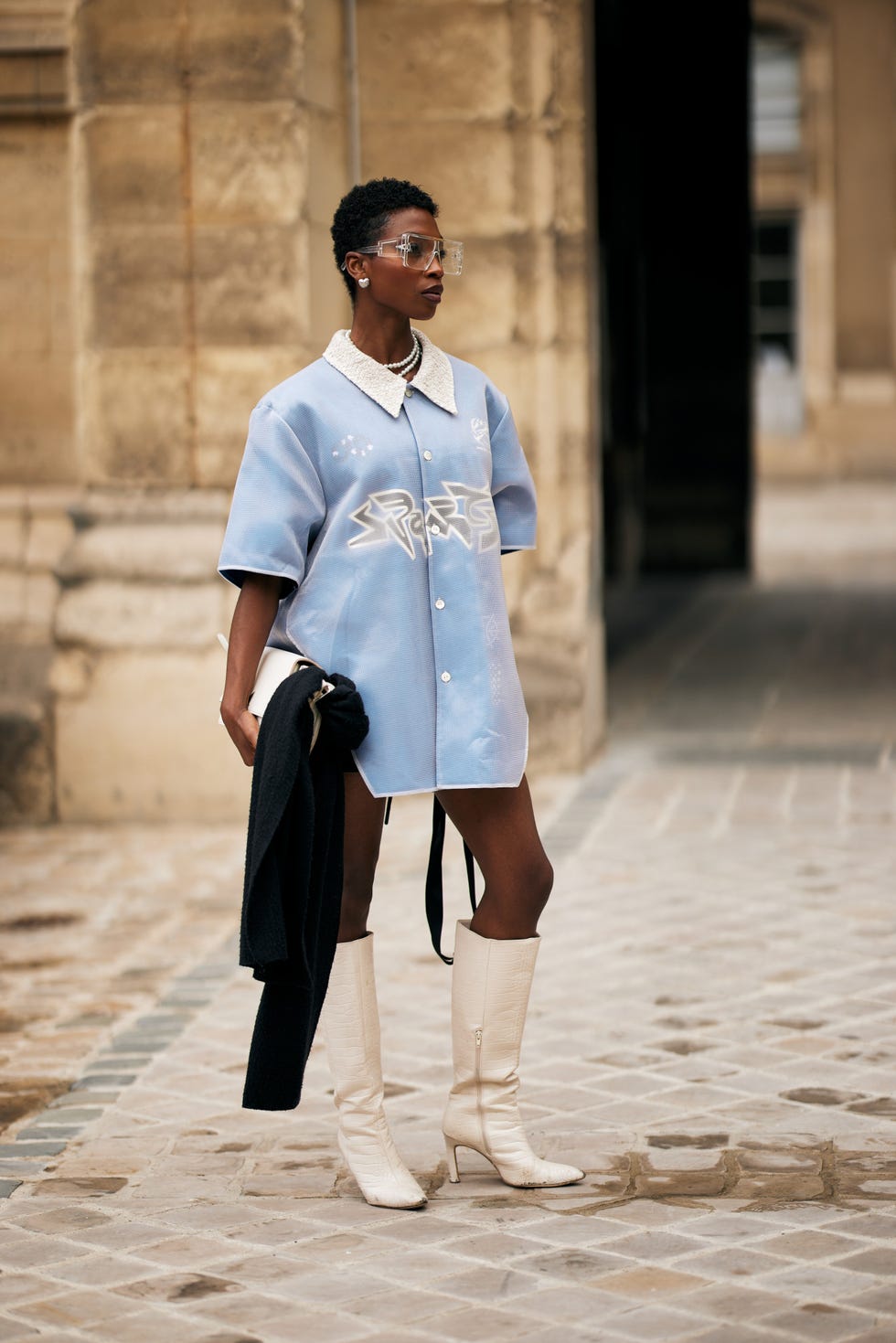 Woman walking on the sidewalk