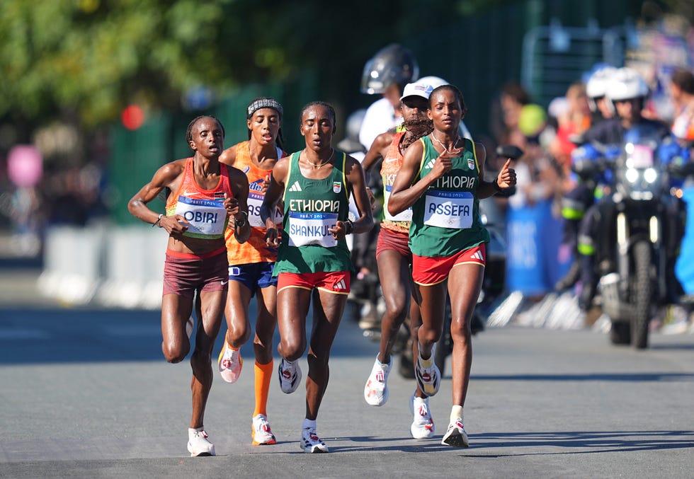 Amane Beriso Shankule of Ethiopia, Tigst Assefa of Ethiopia, Sharon Lokedi of Kenya, Hellen Obiri of Kenya and Sifan Hassan of the Netherlands in action during the Women's Marathon on Day 16 of the Olympic Games Paris 2024 at the Pont Alexandre III on August 11, 2024 in Paris, France Photo by Ulrik Pedersendefodi Images via Getty Images