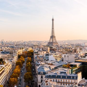 paris skyline with eiffel tower at sunset, aerial view, france