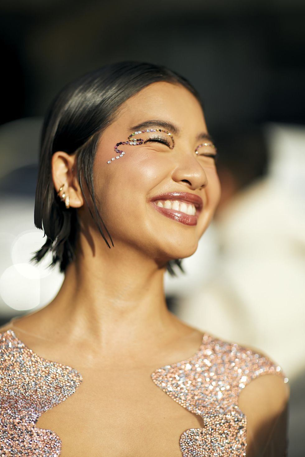 a woman with a tattoo on her face