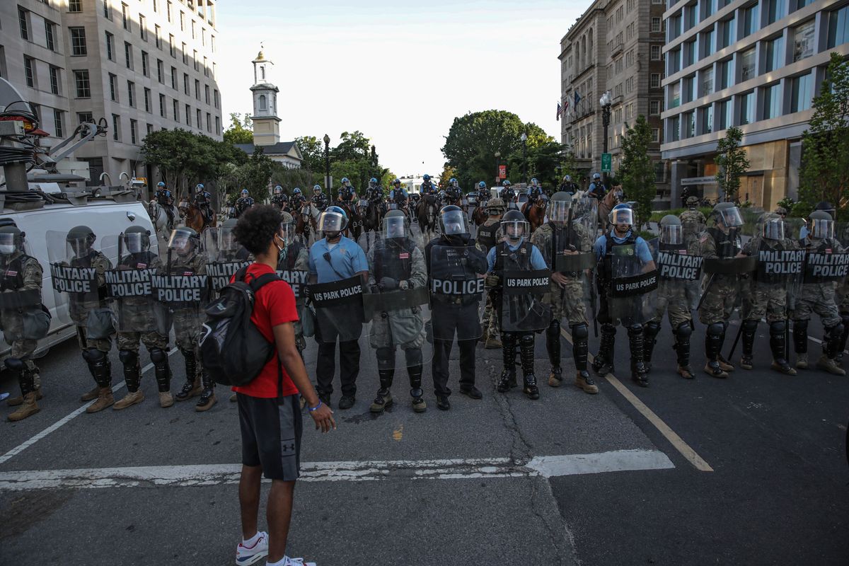 washington, usa   june 2 security forces block the road as protesters gather near lafayette park ahead of president trump's trip to st john's church in washington, united states on june 2, 2020 protests and riots continue in cities across us following the death of george floyd, an unarmed black man who died after being pinned down by a white police officer photo by yasin ozturkanadolu agency via getty images