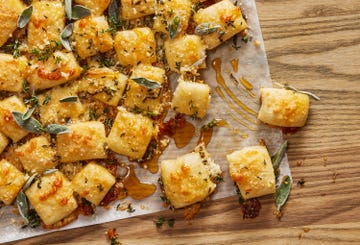 parmesan bread bites topped with sage and hot 
honey