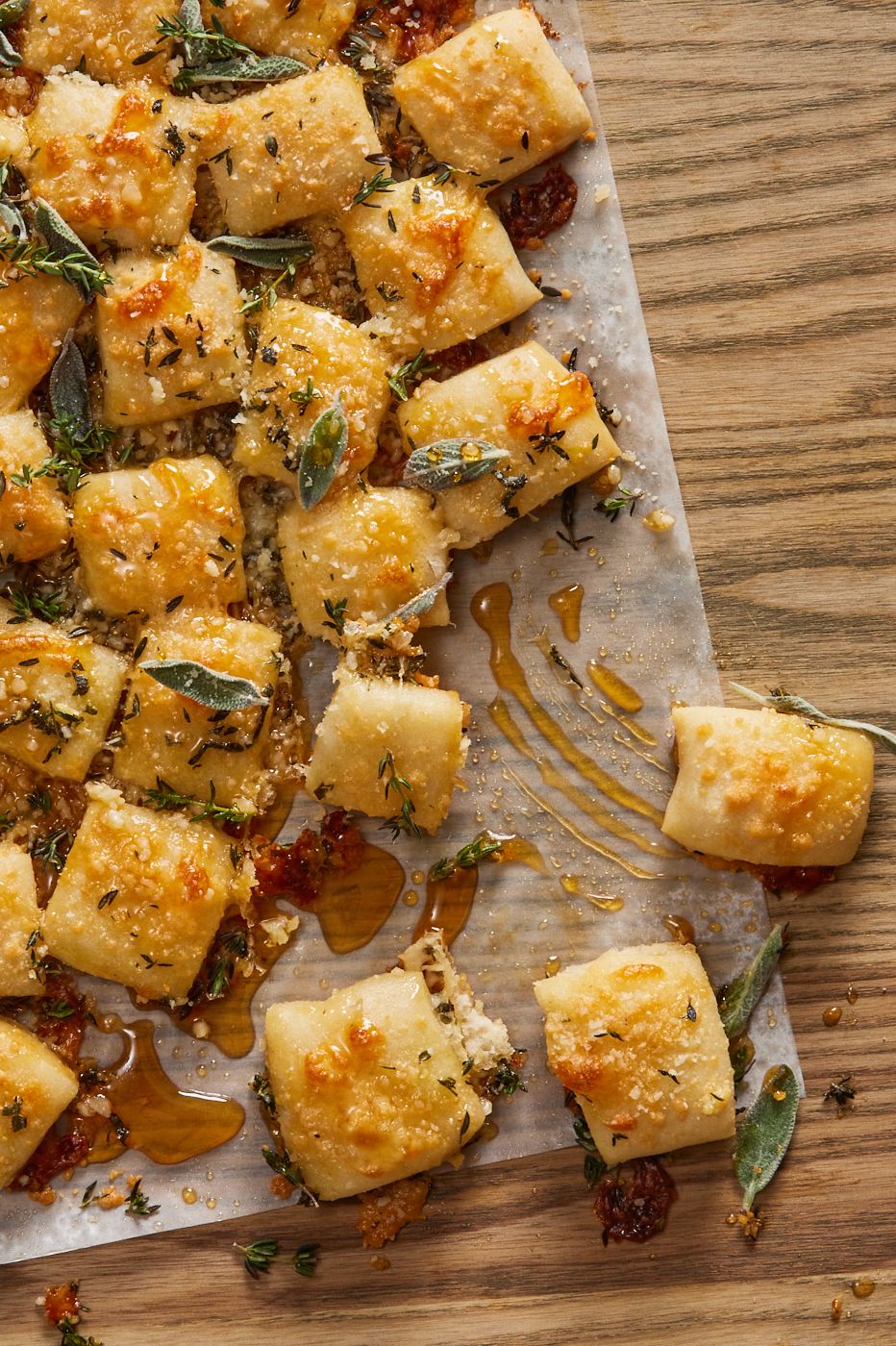 parmesan bread bites topped with sage and hot honey