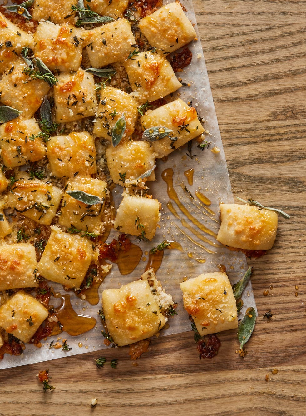 parmesan bread bites topped with sage and hot honey